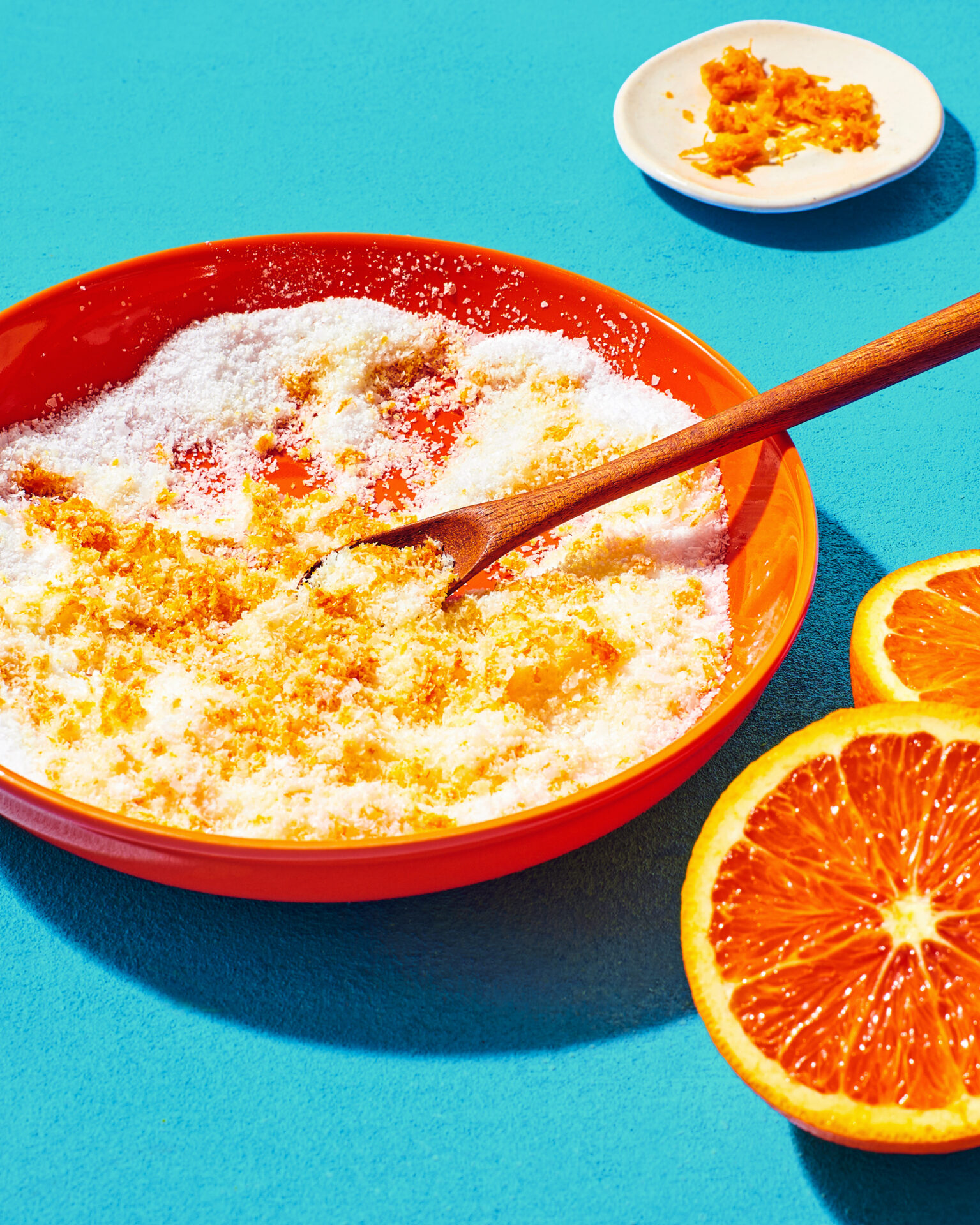 Large bowl of Cara Cara citrus bath salt with Peelz citrus zest.