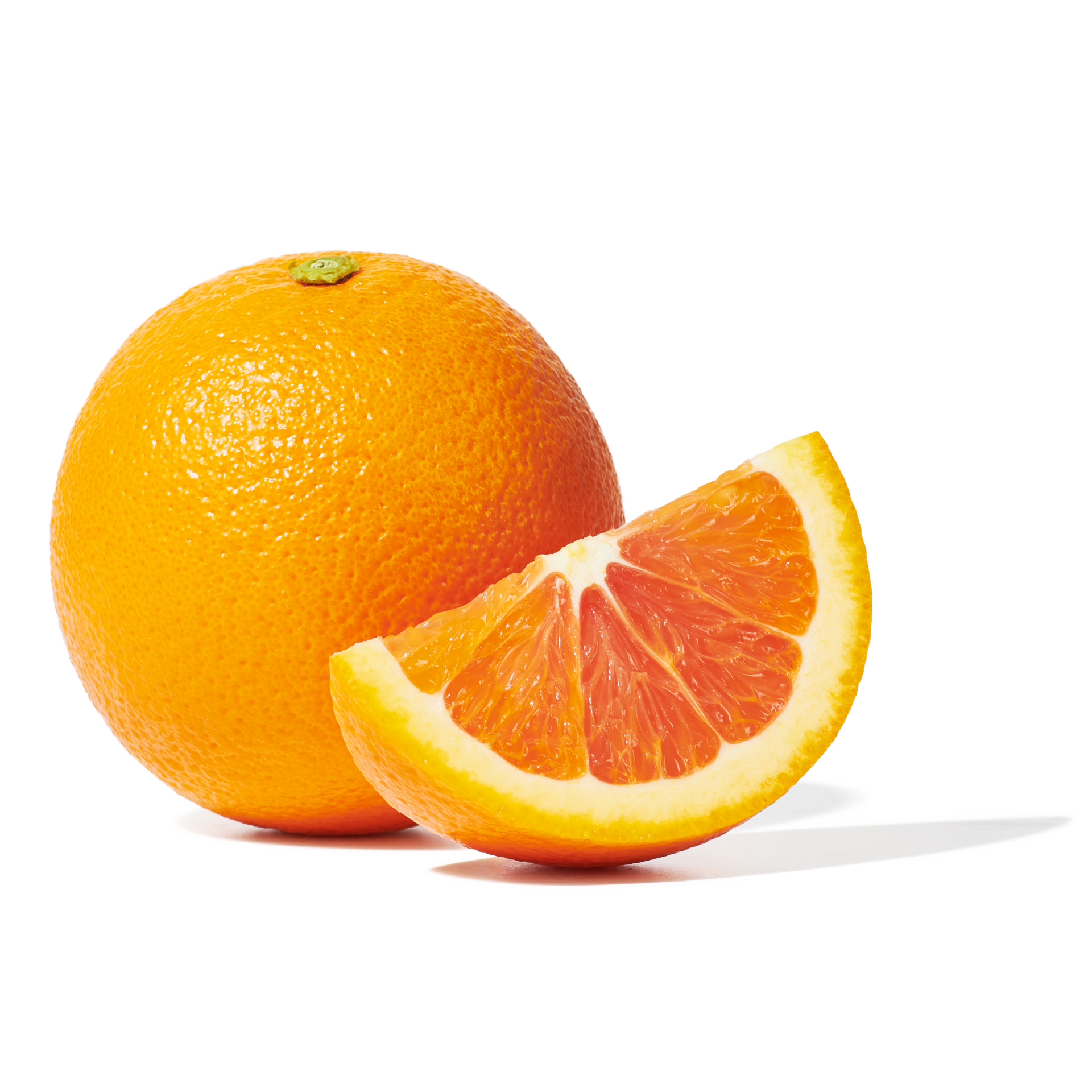 A whole cara cara citrus with a cara cara wedge