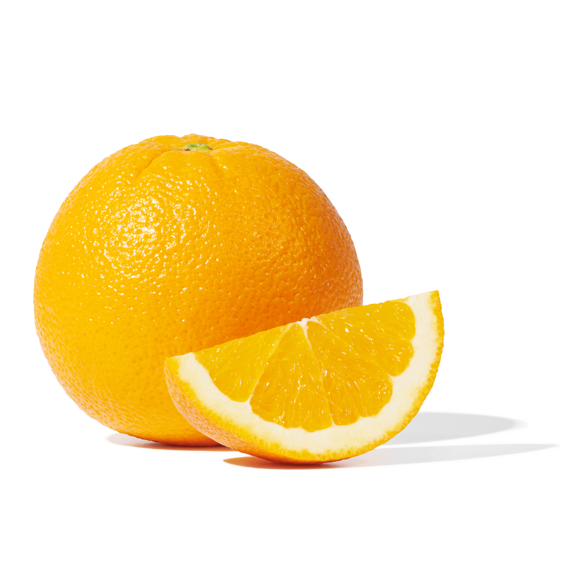 A whole Peelz navel orange with an orange wedge